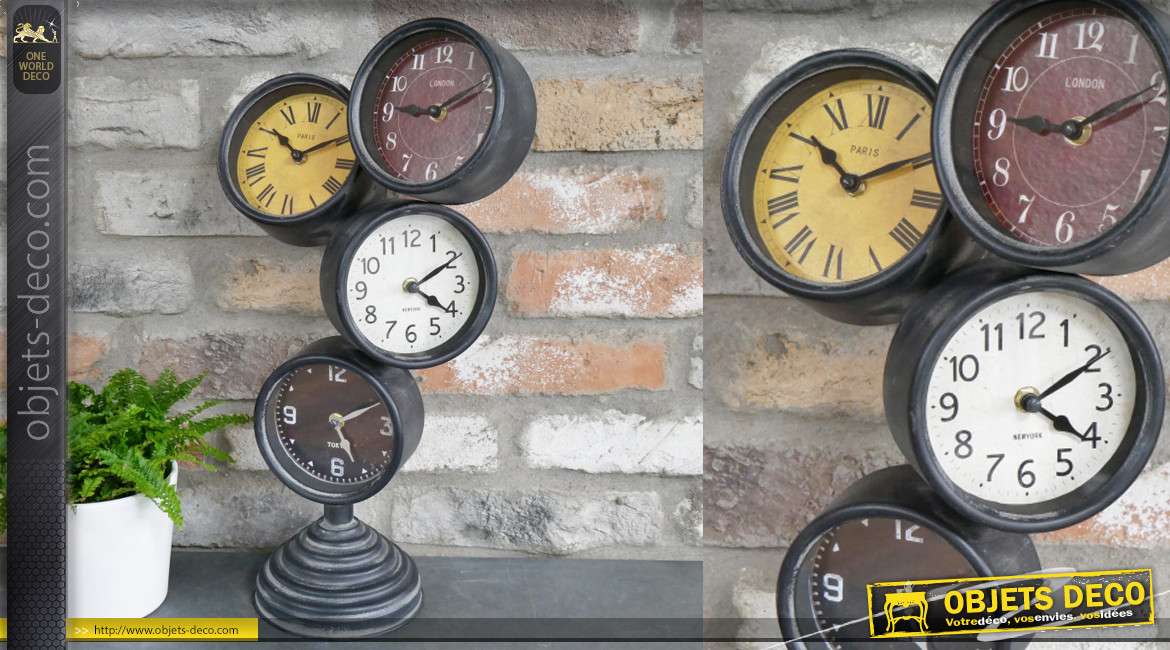 Horloge à poser en métal, forme destructurée avec 4 cadrans superposés, 48cm