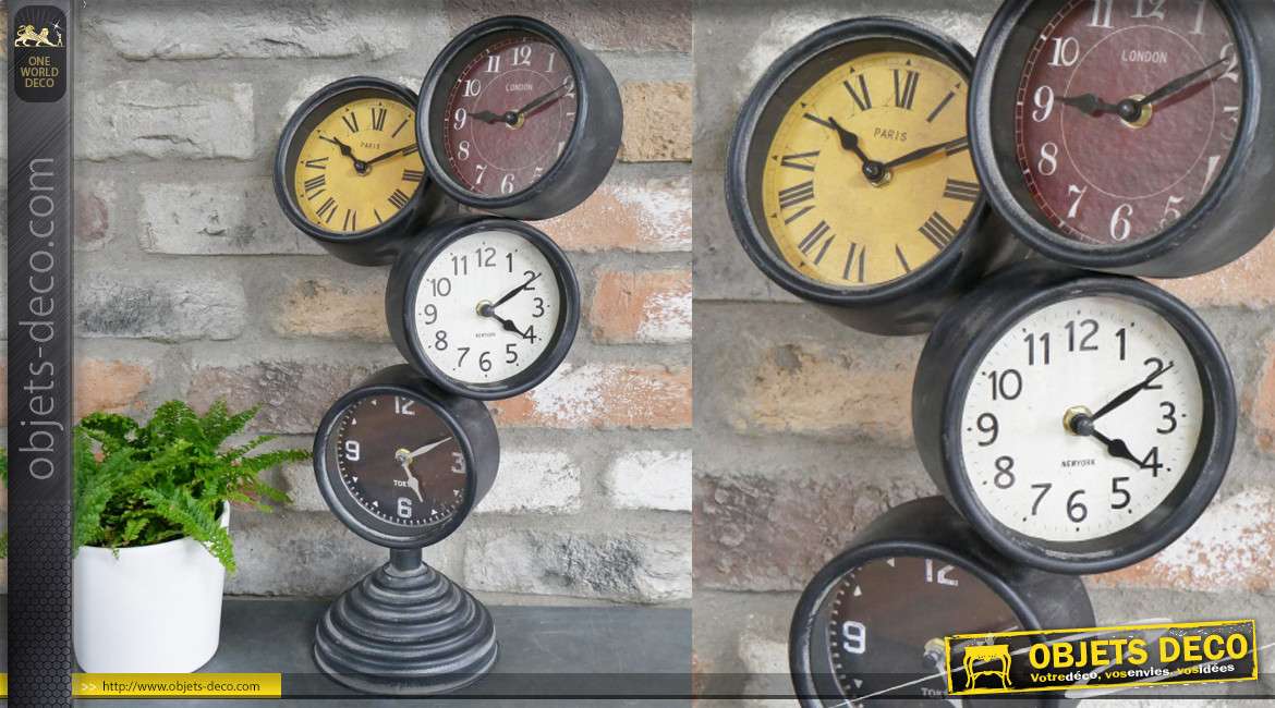 Horloge à poser en métal, forme destructurée avec 4 cadrans superposés, 48cm