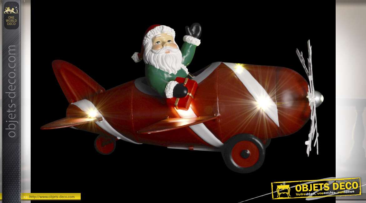 Représentation en métal du Père Noel dans un avion, éclairage LED intégré, 34cm